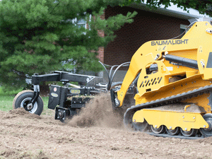 BaumaLight TRL620Y stand on compact mini loader