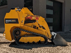 BaumaLight TRL620Y stand on compact mini loader