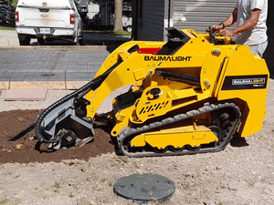 BaumaLight TRL620Y stand on compact mini loader