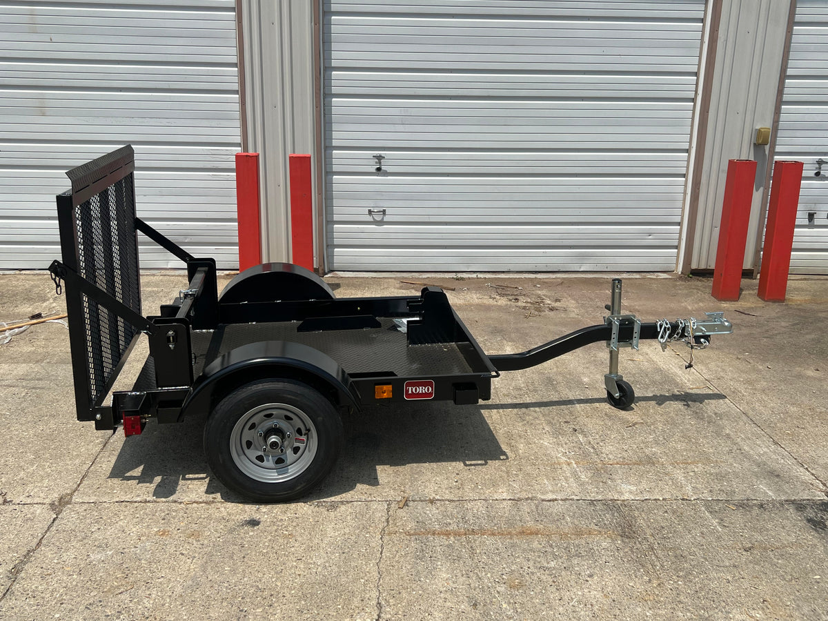 Toro tow behind online dump cart